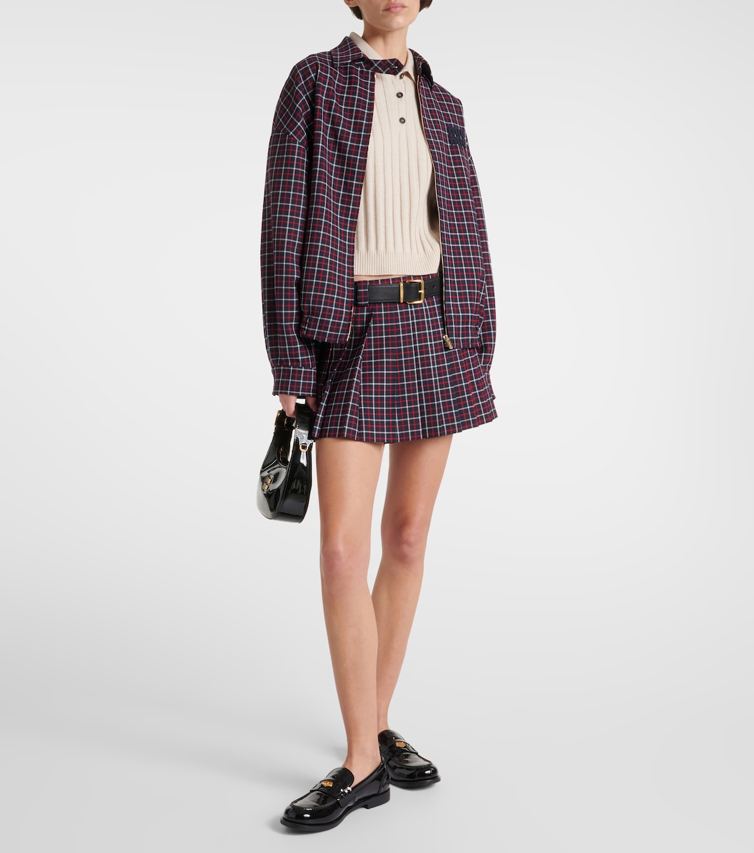 Checked pleated virgin wool miniskirt | Miu Miu