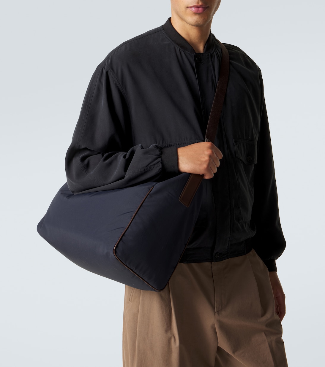 Logan E/W leather-trimmed crossbody bag | The Row