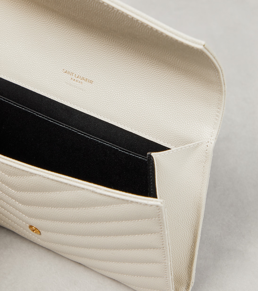 Cassandre Small matelassé leather clutch | Saint Laurent