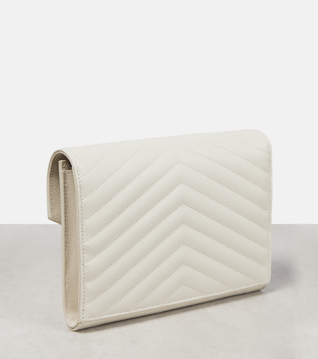 Cassandre Small matelassé leather clutch | Saint Laurent