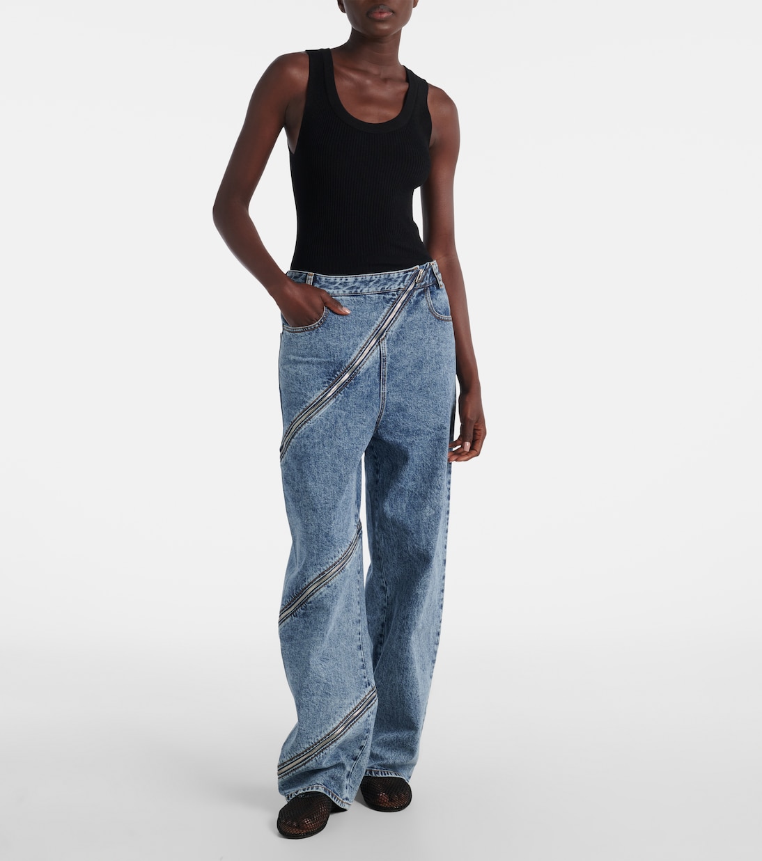 Jeans anchos Spiral de denim de tiro alto | Alaïa
