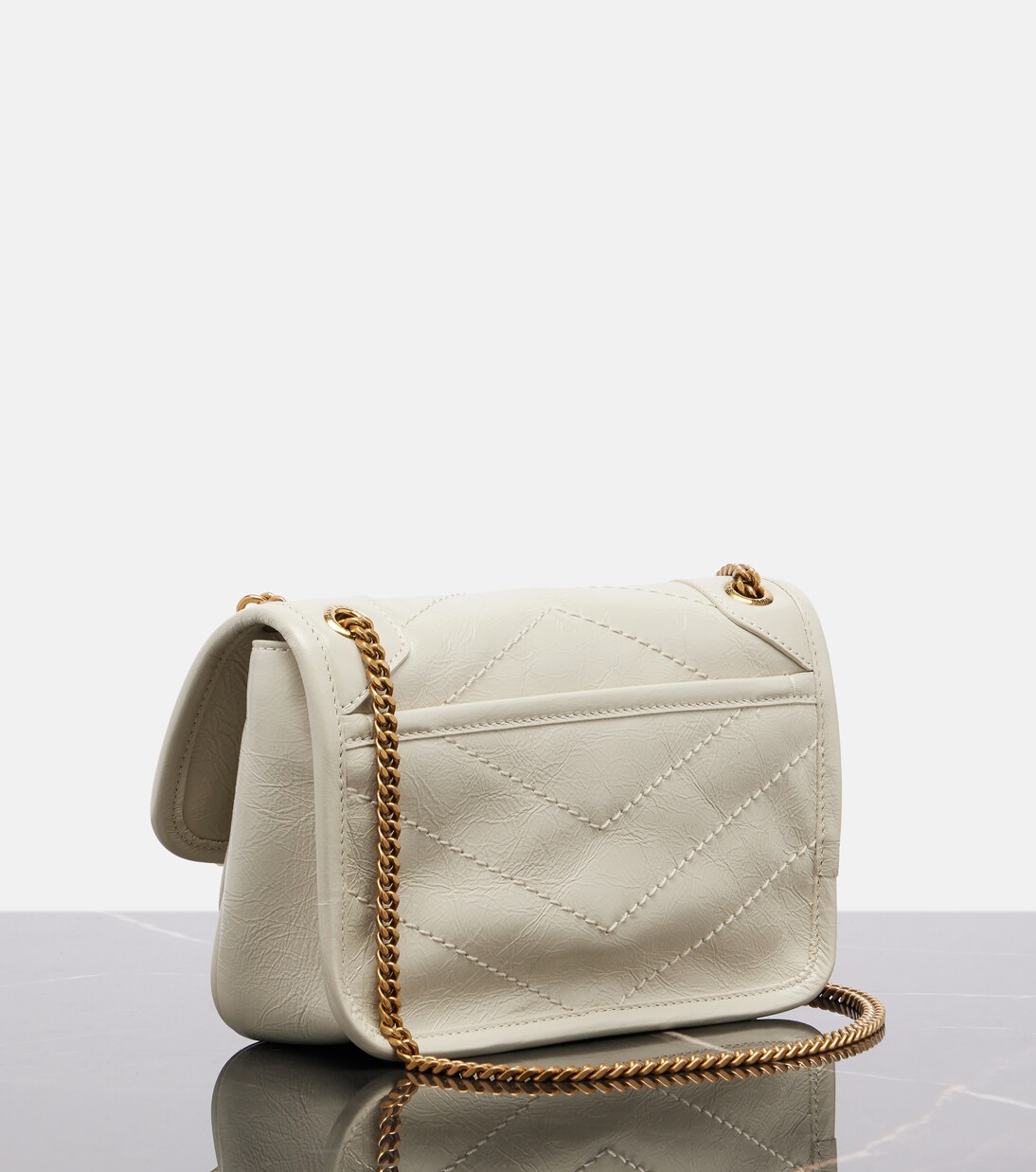 Niki Cassandre Mini leather shoulder bag | Saint Laurent