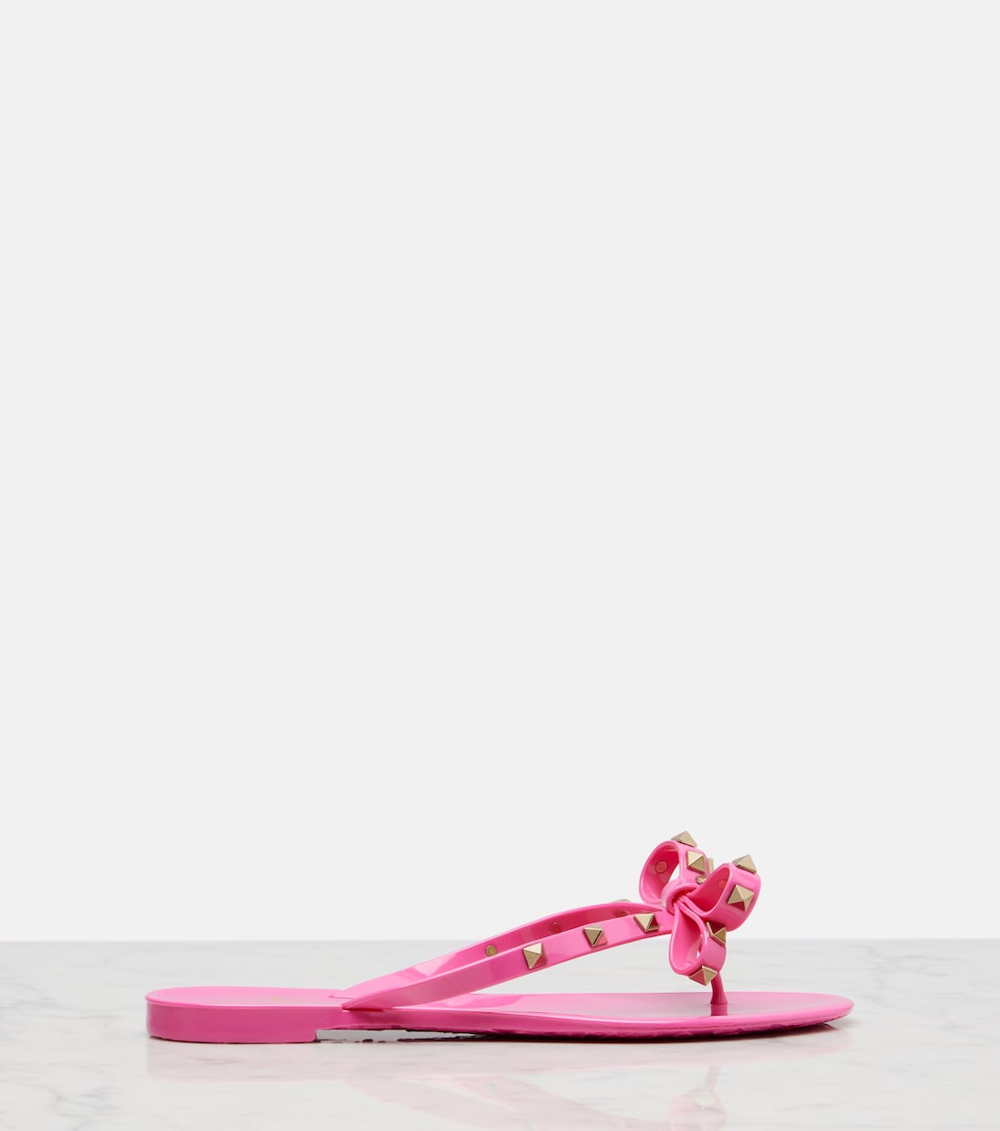 Rockstud bow-detail thong sandals | Valentino Garavani