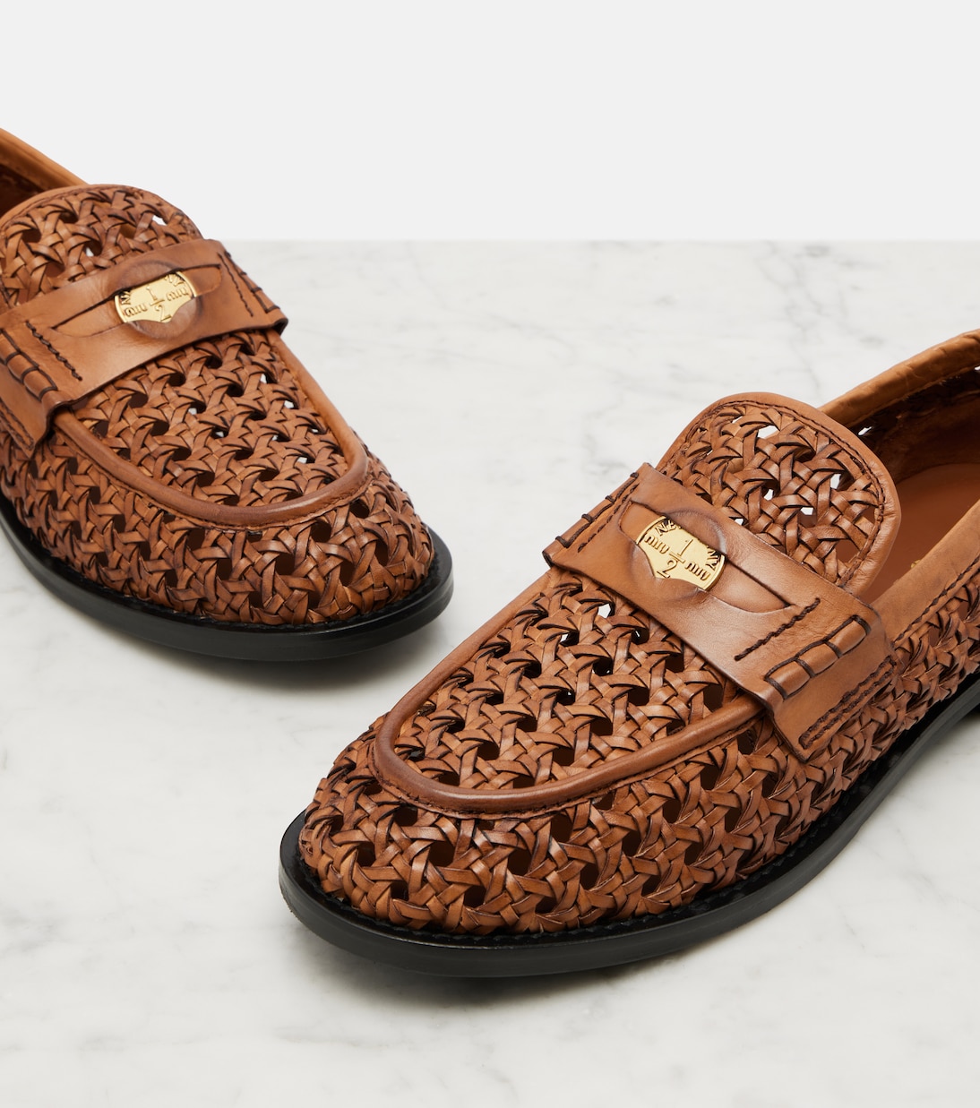 Woven leather penny loafers | Miu Miu