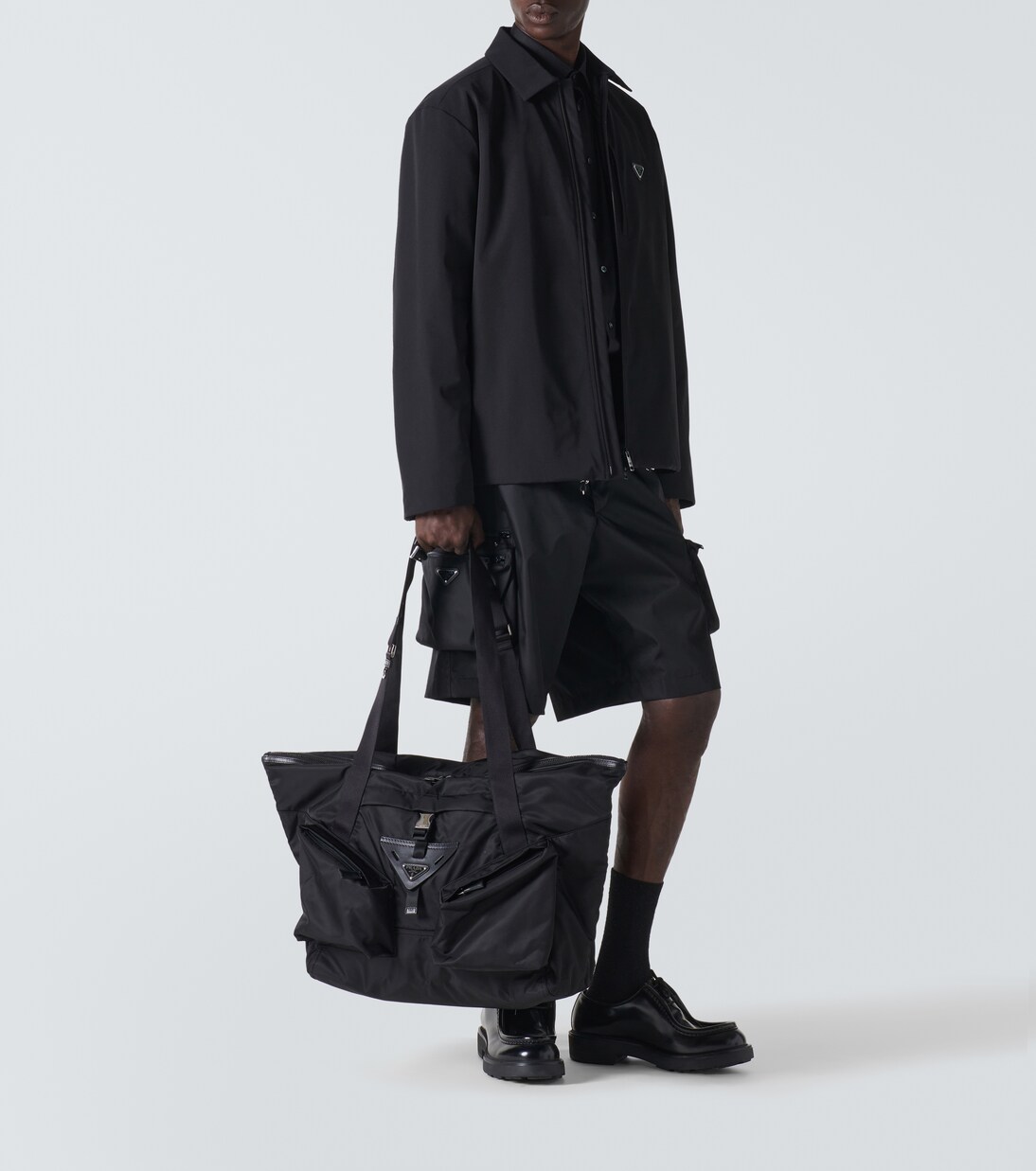 Re-Nylon leather-trimmed duffel bag | Prada