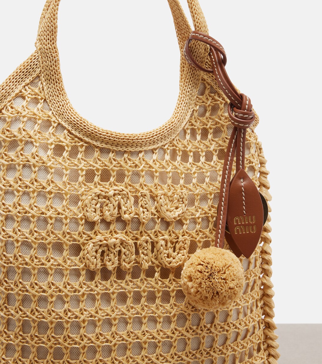 Ivy crochet raffia shoulder bag | Miu Miu