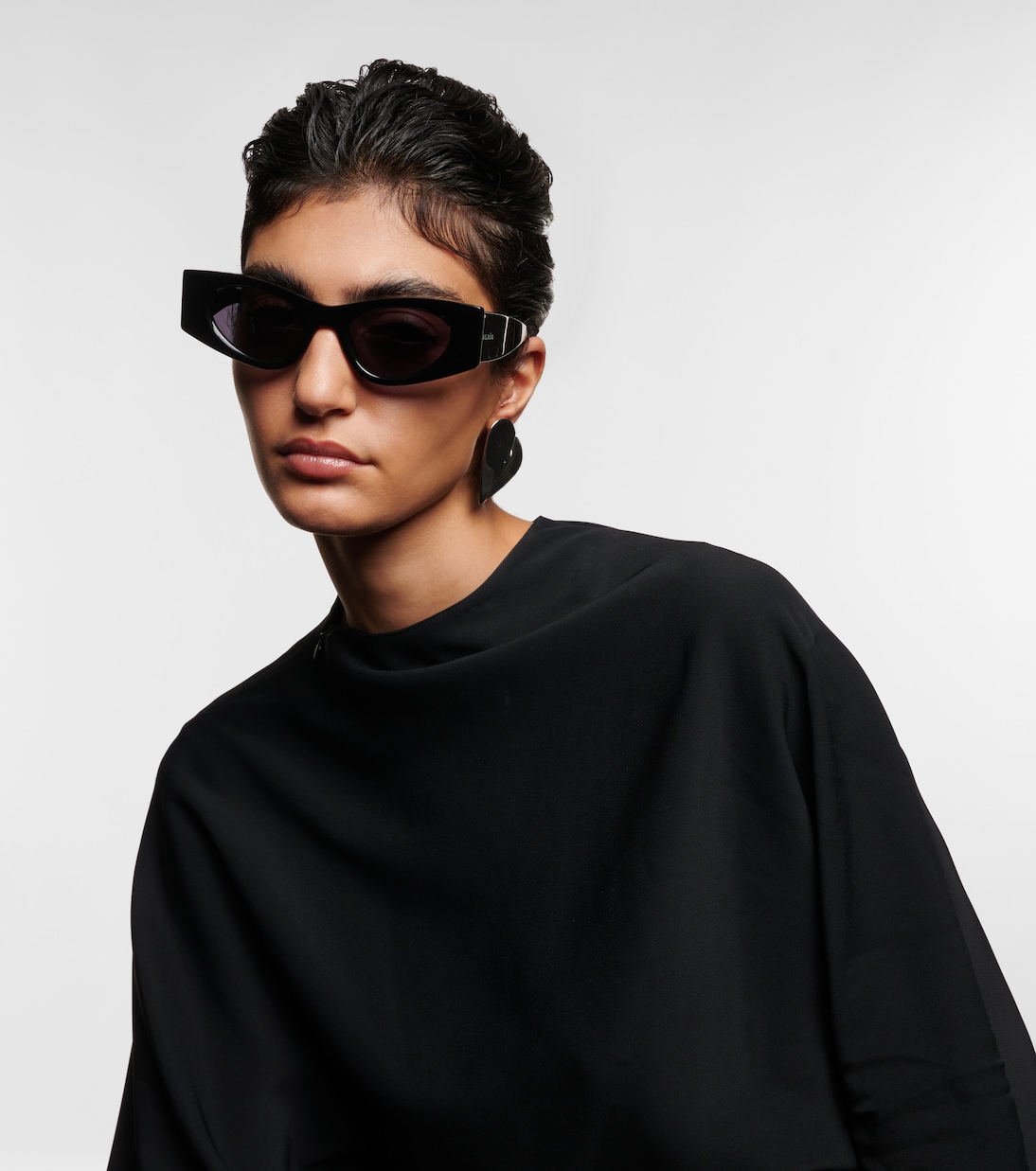 Logo oval sunglasses | Alaïa