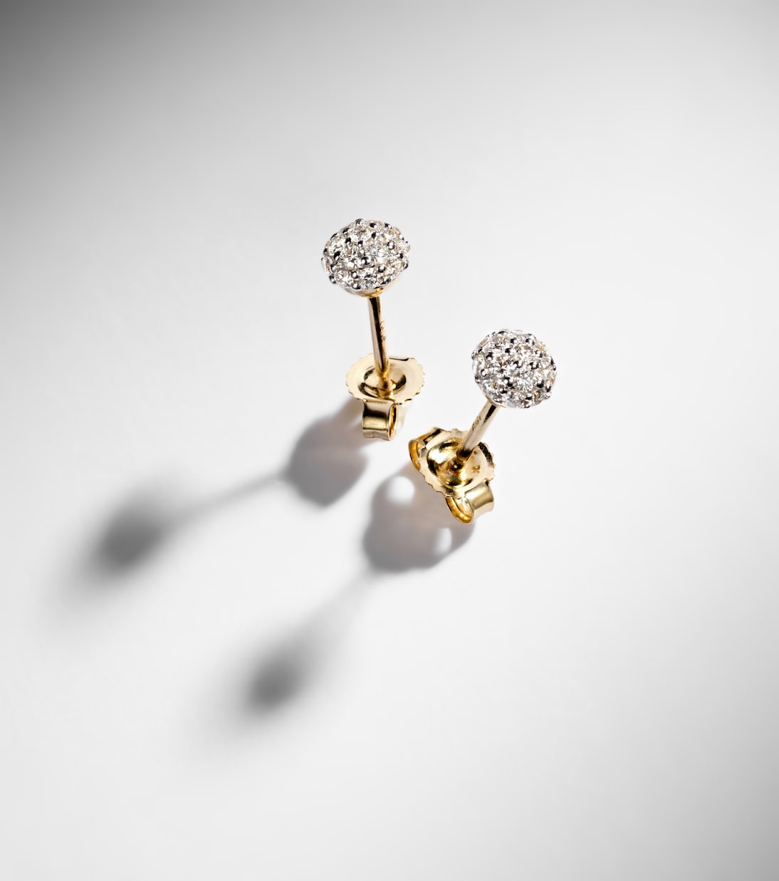 Dainty Mirror Ball 10kt gold stud earrings with diamonds | Stone and Strand