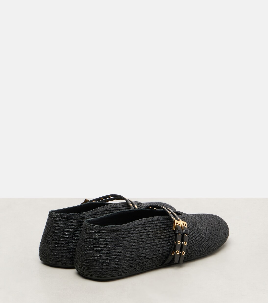 Leather-trimmed ballet flats | Alaïa