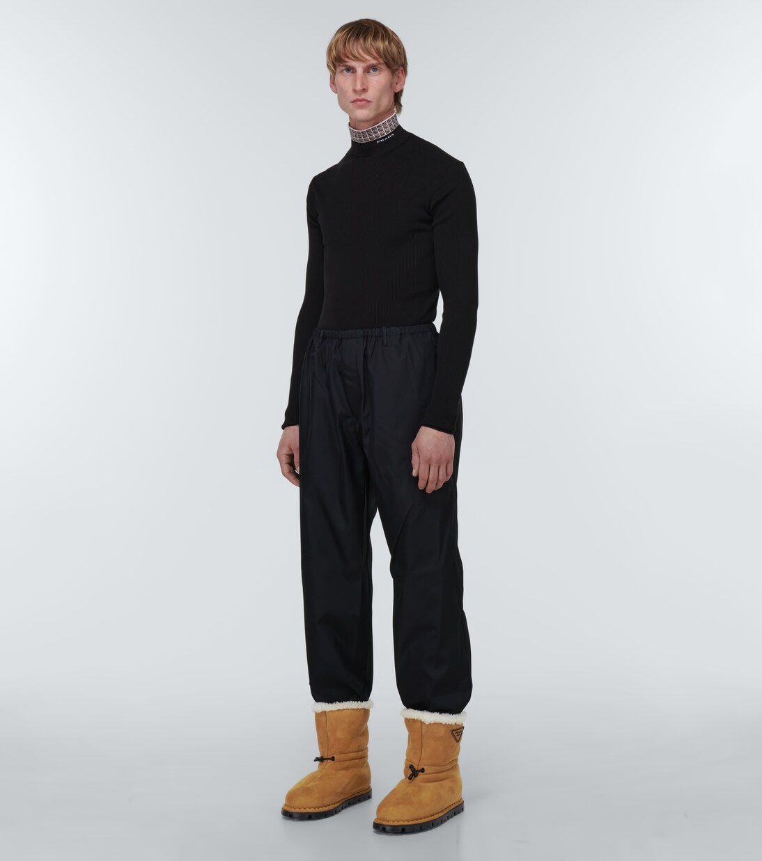 Suede shearling-lined logo boots | Prada