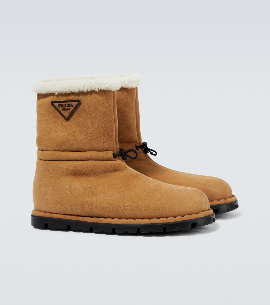 Suede shearling-lined logo boots | Prada