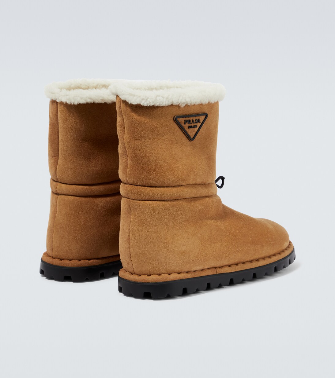 Suede shearling-lined logo boots | Prada