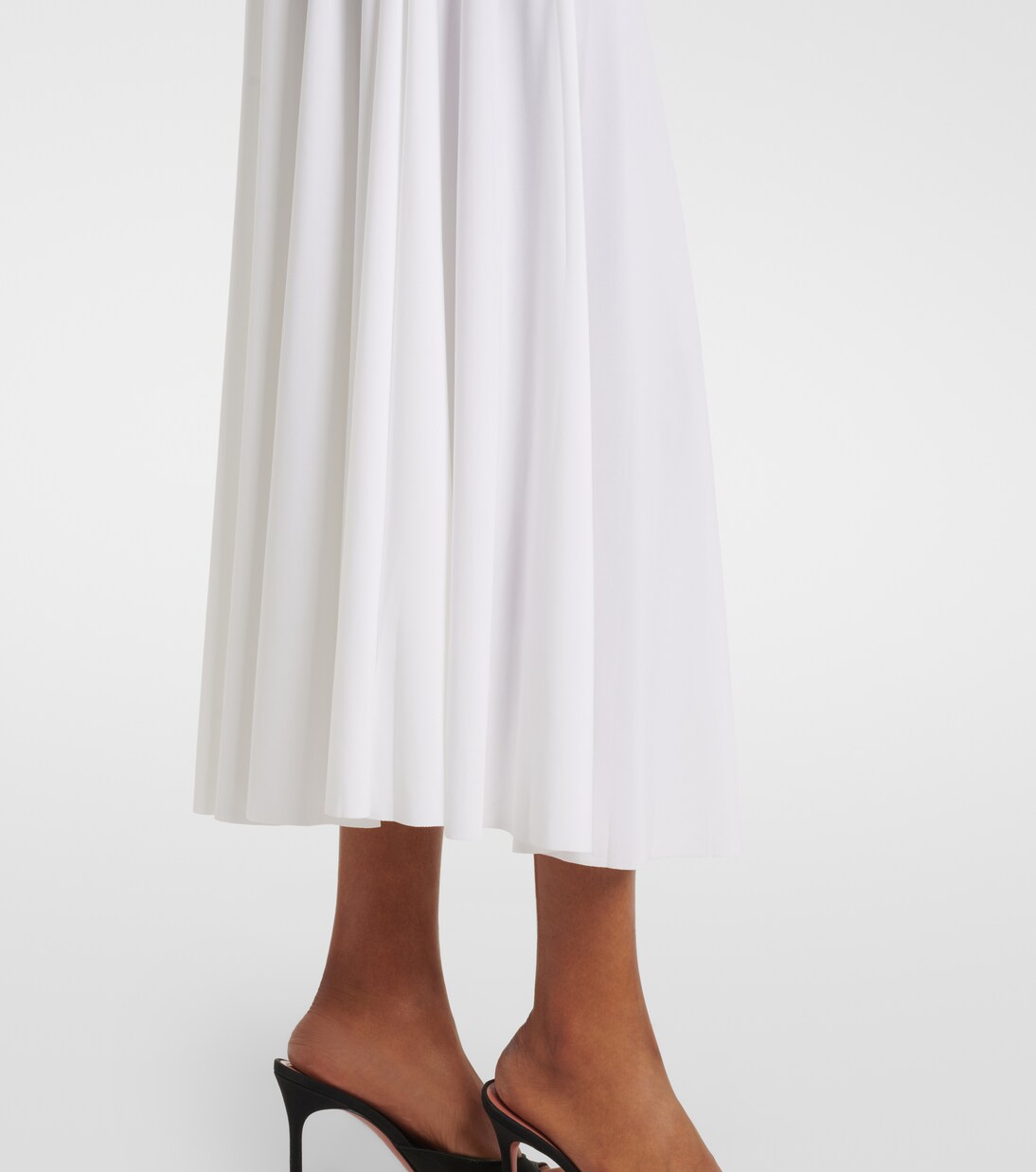 Pleated jersey midi skirt | Norma Kamali