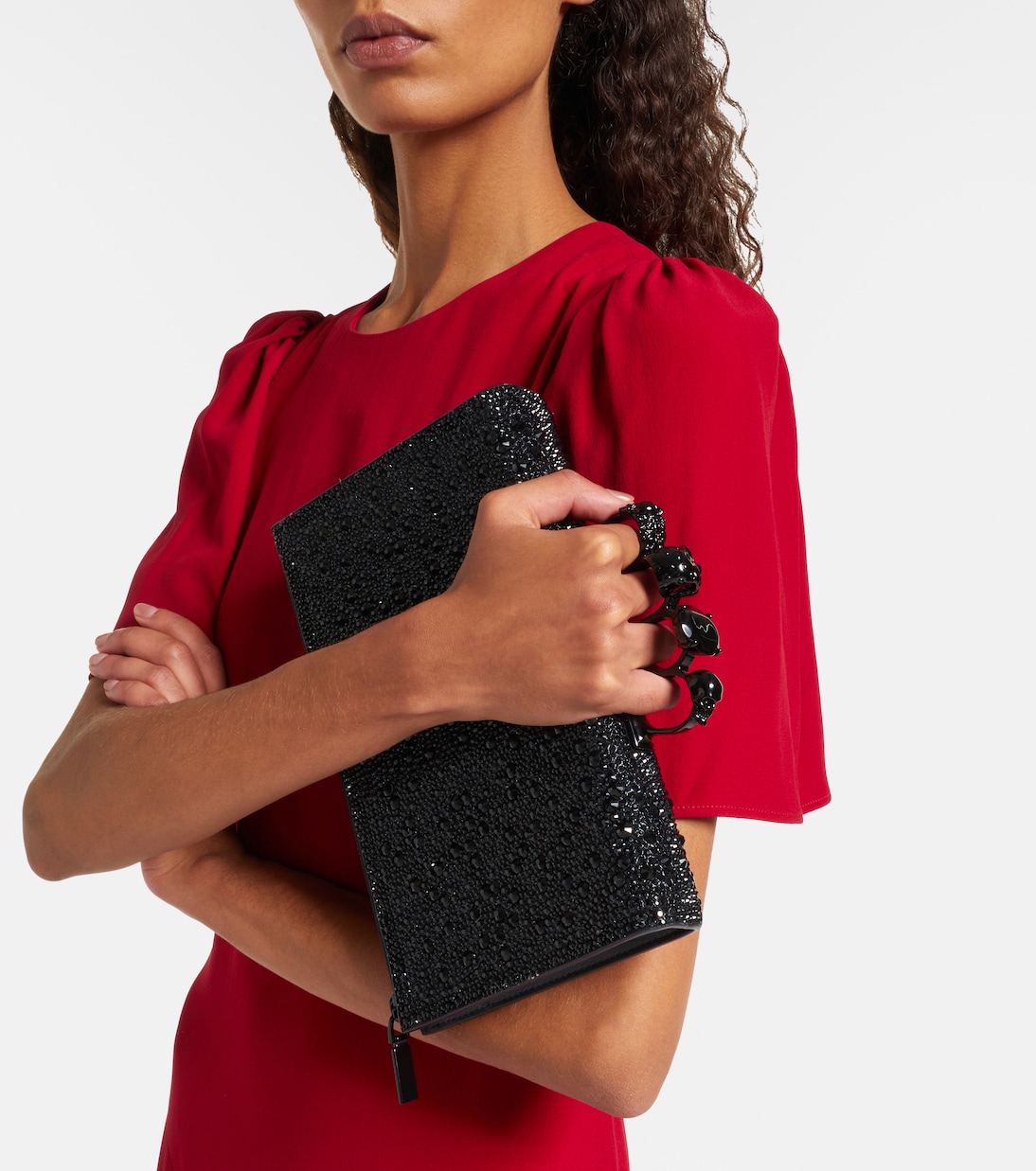 Skull Knuckle studded leather pouch | McQueen