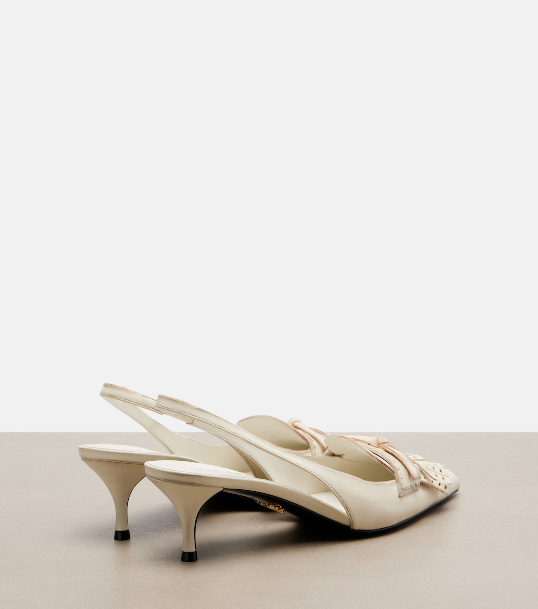 Bow-detail leather slingback pumps | Prada