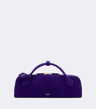 Le Teckel Small suede clutch | Alaïa