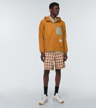 Dry Check shorts in brown - And Wander | Mytheresa