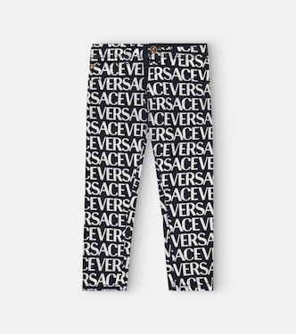 Jean imprimé en coton à logo | Versace Kids