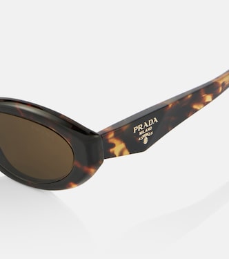 Symbole cat-eye sunglasses in brown - Prada | Mytheresa