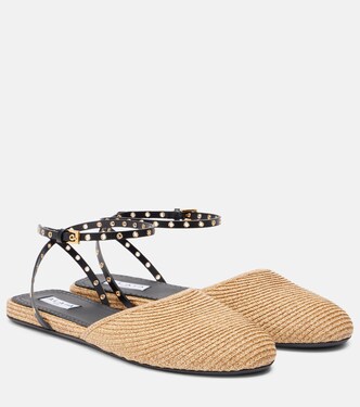 Leather-trimmed raffia flats | Alaïa