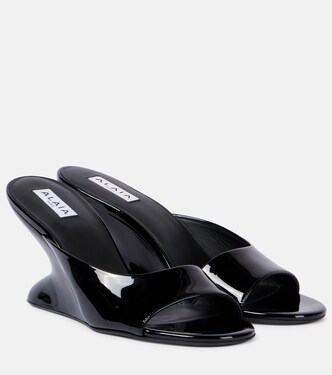 Curve 75 patent leather wedge mules | Alaïa