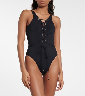 Lace-up swimsuit in black - Alaia | Mytheresa
