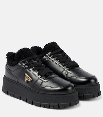 Shearling-lined leather platform sneakers | Prada