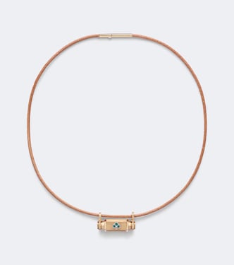 Clover Smash 18kt gold and leather locket necklace with emeralds | Marie Lichtenberg
