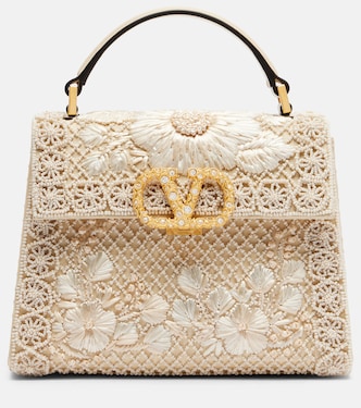 VSling Mini embellished top-handle bag | Valentino Garavani