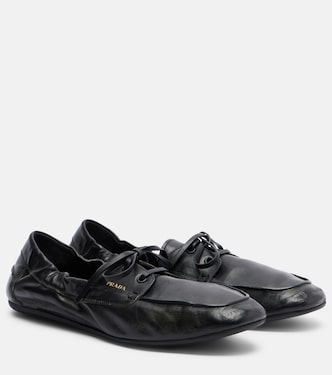 Shuffle leather boat shoes | Prada