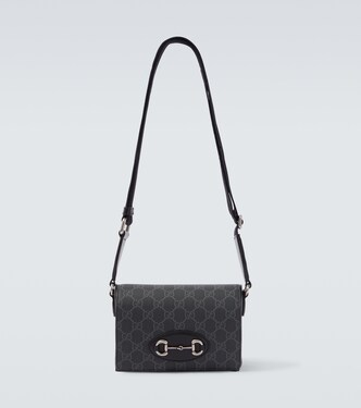 GG Supreme leather-trimmed canvas crossbody bag | Gucci