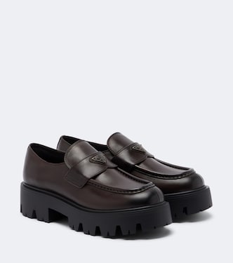 Logo leather platform loafers | Prada
