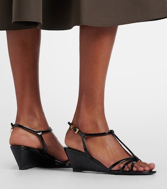 Patent leather wedge sandals in black - Prada | Mytheresa