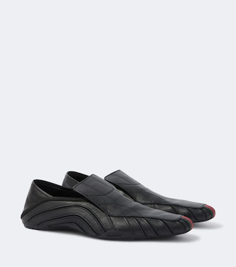 Mesh-trimmed leather loafers | Gucci