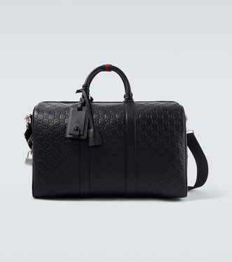GG Emblem Medium leather duffel bag | Gucci