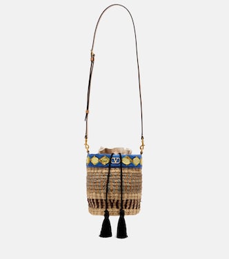 VLogo Small embellished raffia-effect bucket bag | Valentino Garavani