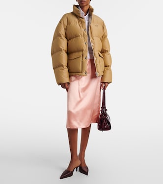 Logo cotton-blend puffer jacket in beige - Prada | Mytheresa
