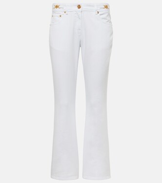 Embellished low-rise flared jeans | Versace