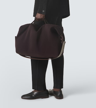 Pleats duffel bag in purple - Homme Plisse Issey Miyake | Mytheresa