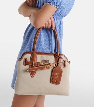 Aventure Small canvas tote bag in beige - Miu Miu | Mytheresa