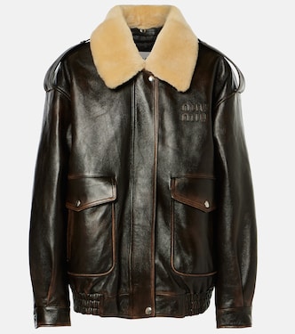 Logo faux shearling-trimmed leather jacket | Miu Miu