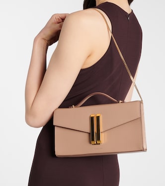 デメリエー VANCOUVER CLUTCH BAG ショルダーバッグ ベージュ Vancouver leather clutch in beige - De Mellier | Mytheresa