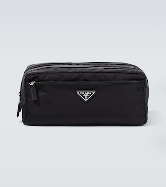 Re-Nylon leather-trimmed travel bag | Prada