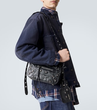Le Cagole XS leather crossbody bag in black - Balenciaga | Mytheresa Le Cagole XS leather crossbody bag in black - Balenciaga | Mytheresa