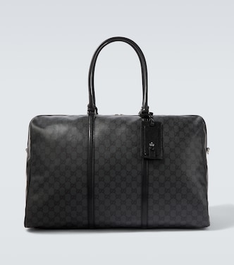 GG canvas leather-trimmed duffel bag | Gucci