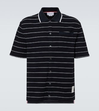 Striped cotton and linen polo shirt | Thom Browne