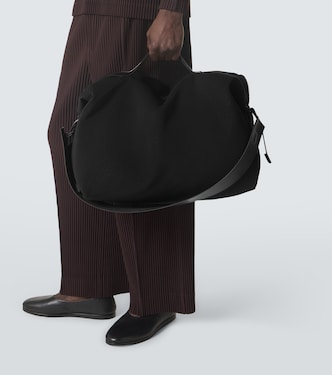 Pleats shoulder bag in black - Homme Plisse Issey Miyake | Mytheresa