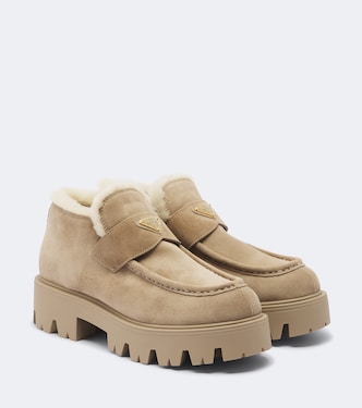 Shearling-trimmed suede platform ankle boots | Prada