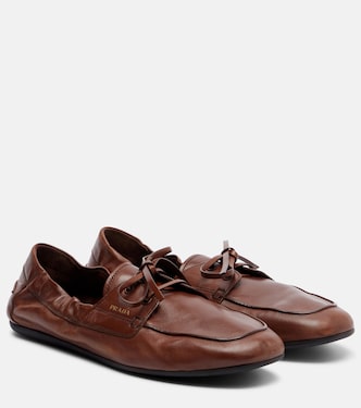 Shuffle leather boat shoes | Prada