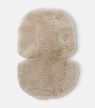 Baby Snuggler® shearling stroller liner | Binibamba